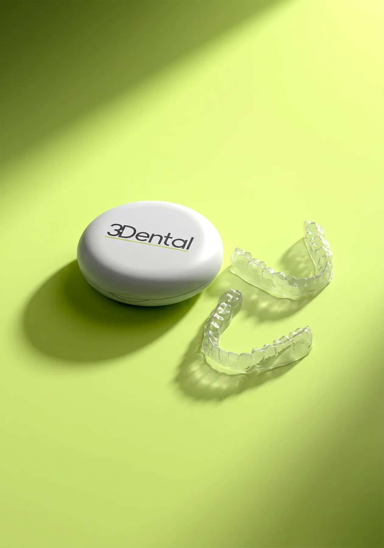 Upper and lower retainers beside a branded 3Dental case